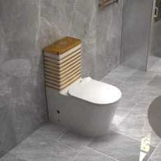 Vintage one-piece toilet with gold and white stripes – luxury bathroom fixtures in Lagos Nigeria